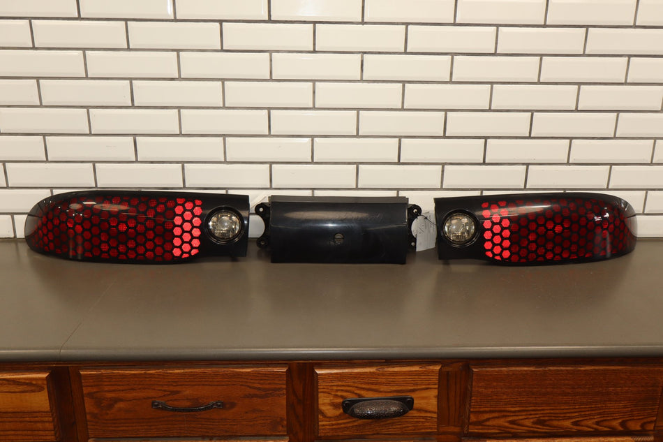 98-02 Pontiac Firebird Taillight Set w/ Center Panel OEM