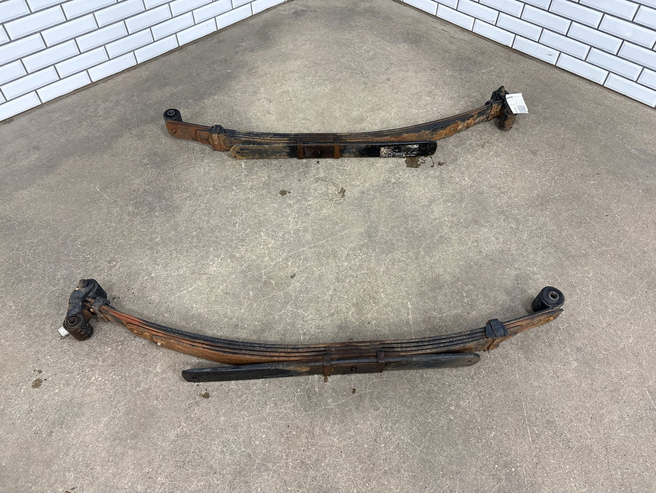 99-07 Ford F250 F350 Super Duty Rear Leaf Spring Pair OEM