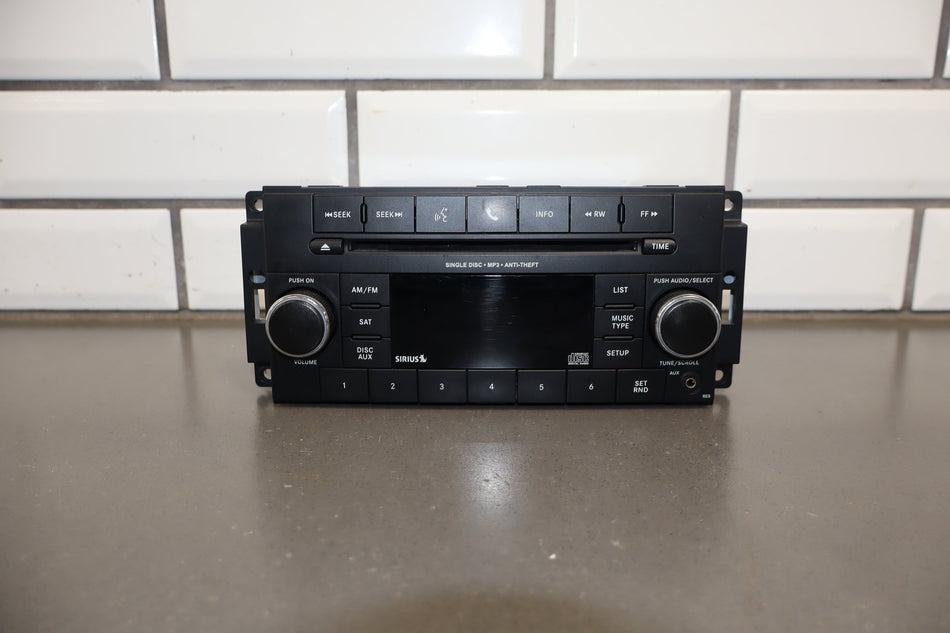 2007-2017 Jeep Dodge JK Chrysler Sirius Aux MP3 AM/FM Radio P05091197AC OEM