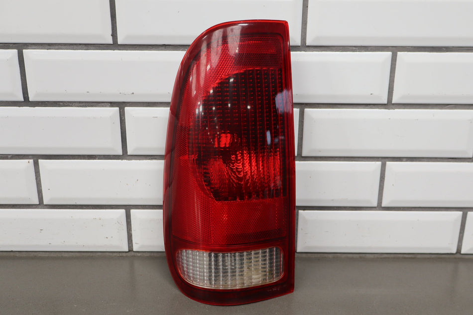 99-04 Ford F250 F350 Super Duty LH Tail Light Styleside OEM