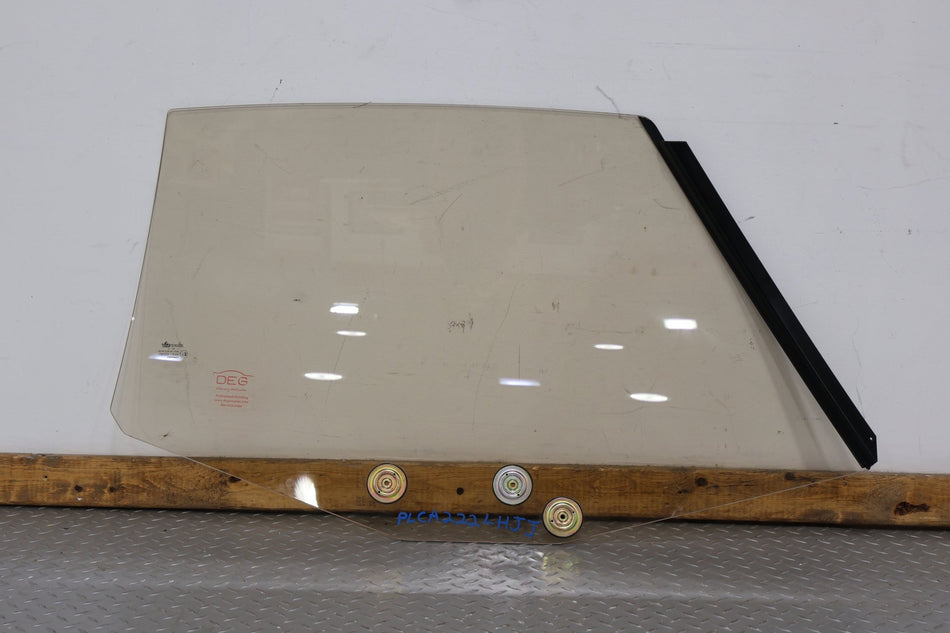 87-93 Cadillac Allante Left Door Glass