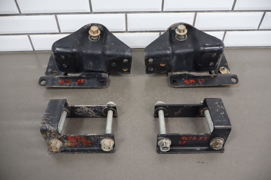 99-04 Ford F250 F350 Front Leaf Spring Hangers Brackets Impact Bar OEM