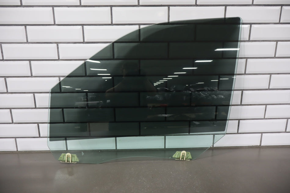 2009-2018 Ram Left Front Door Window 55112391AB OEM
