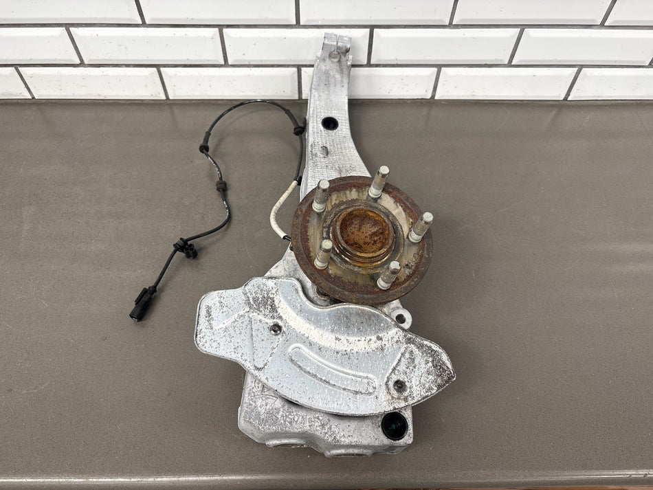 2012-2016 Tesla Model S RWD Driver Left Front Spindle Knuckle OEM