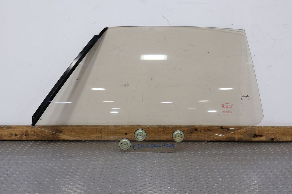 87-93 Cadillac Allante Left Door Glass