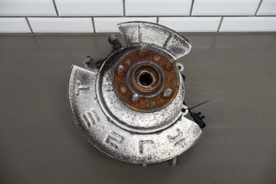 2012-20 Tesla Model S Left Rear Spindle Knuckle Hub ABS