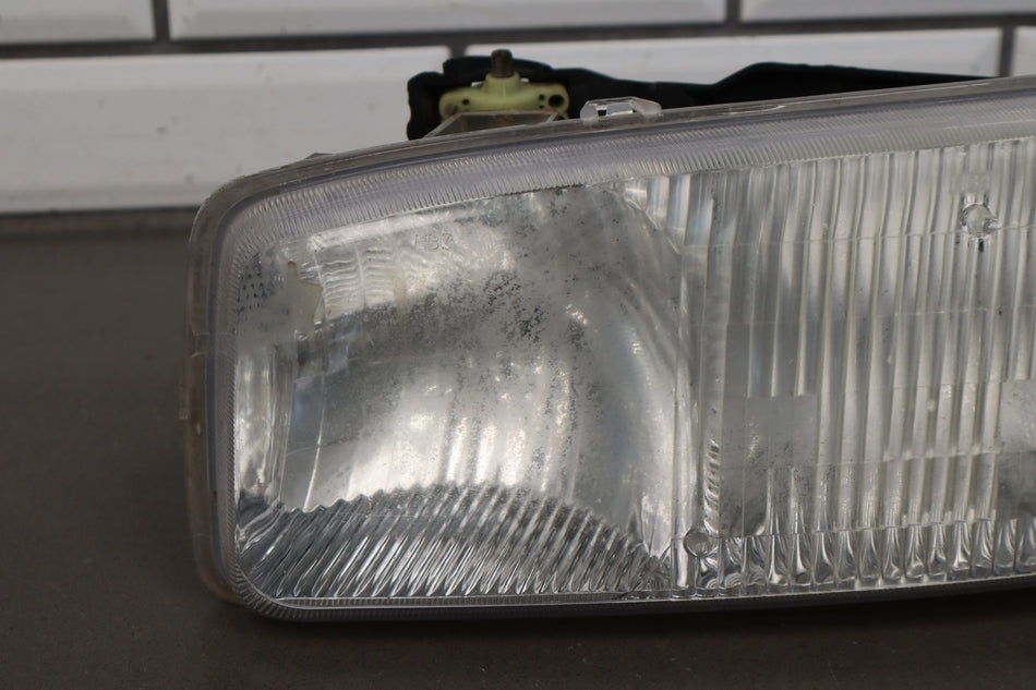 1999-2006 GMC Sierra 2500 Left Headlamp 15850351