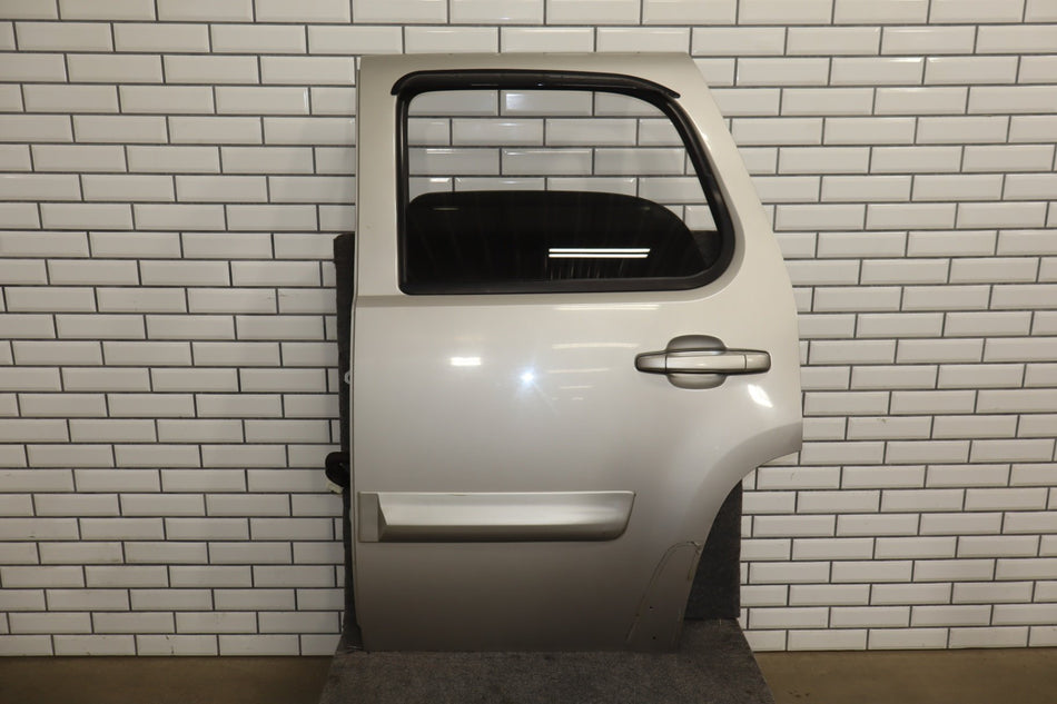 2007-2014 GMC Yukon Left Rear Door Silver Birch ( 59 ) 22892597