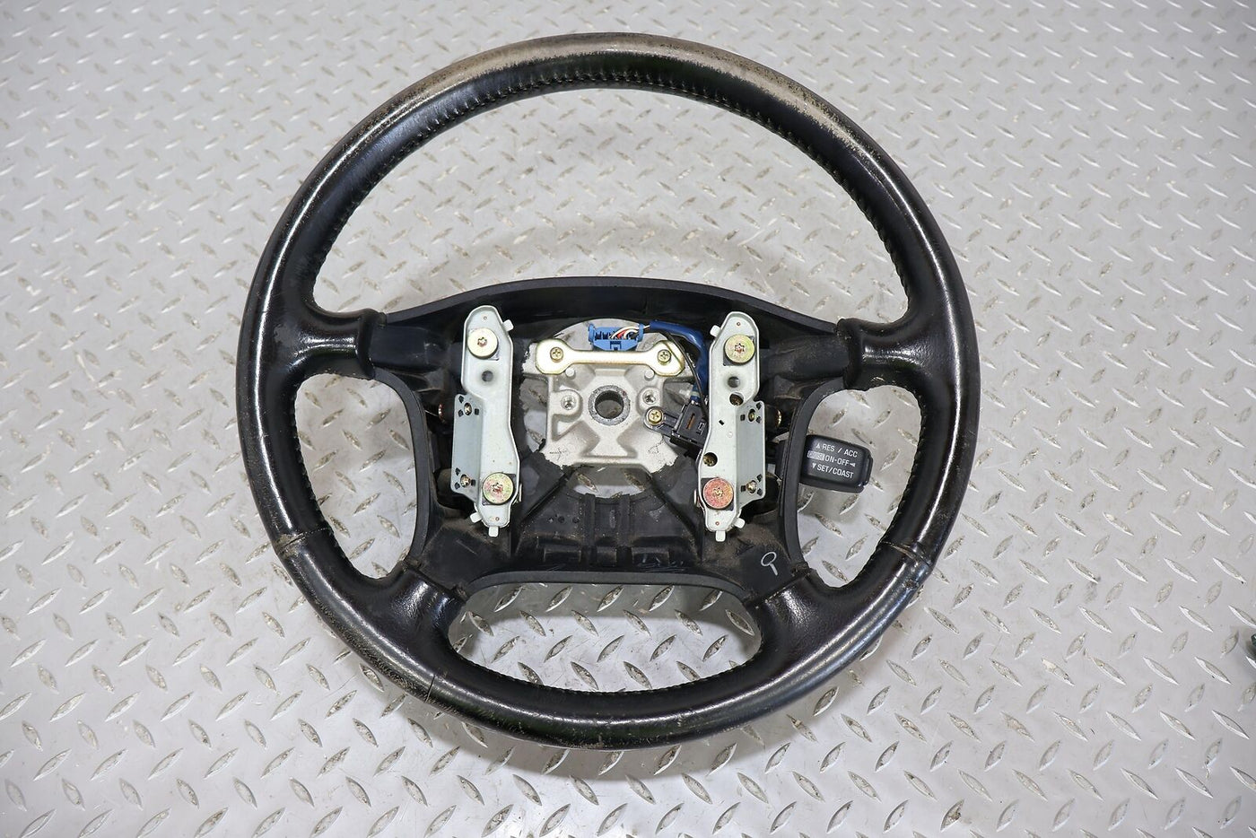 89-92 Toyota Supra MK3 OEM Leather Steering Wheel W/Cruise Control (Black)